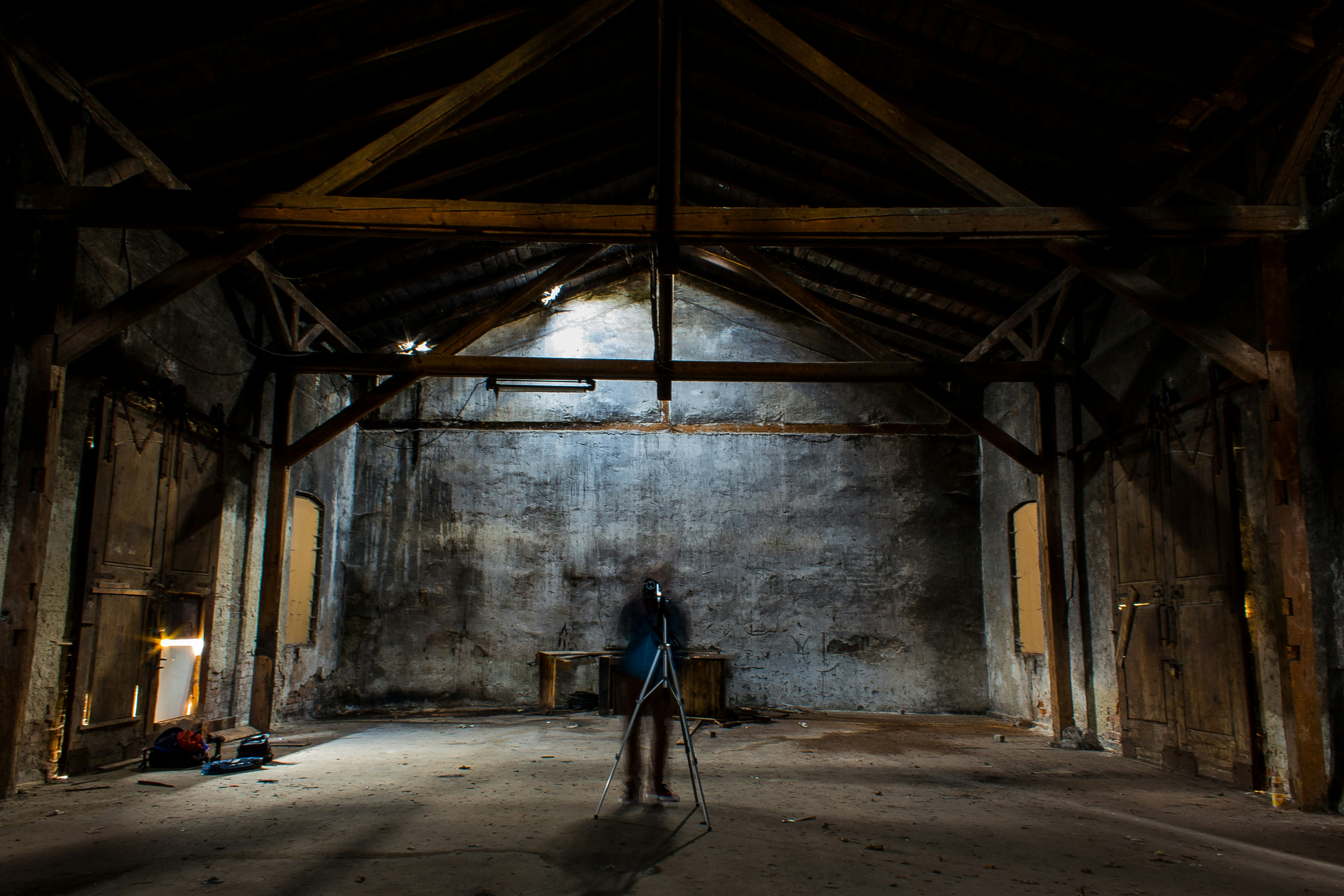 man standing inside building